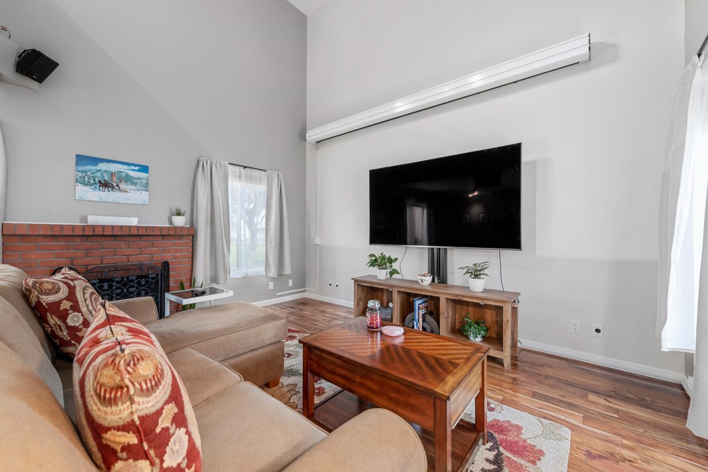 2455 Fairview Lane Santa Clara, CA 95051 - Photo 6 of 25 a living room with furniture and a flat screen tv