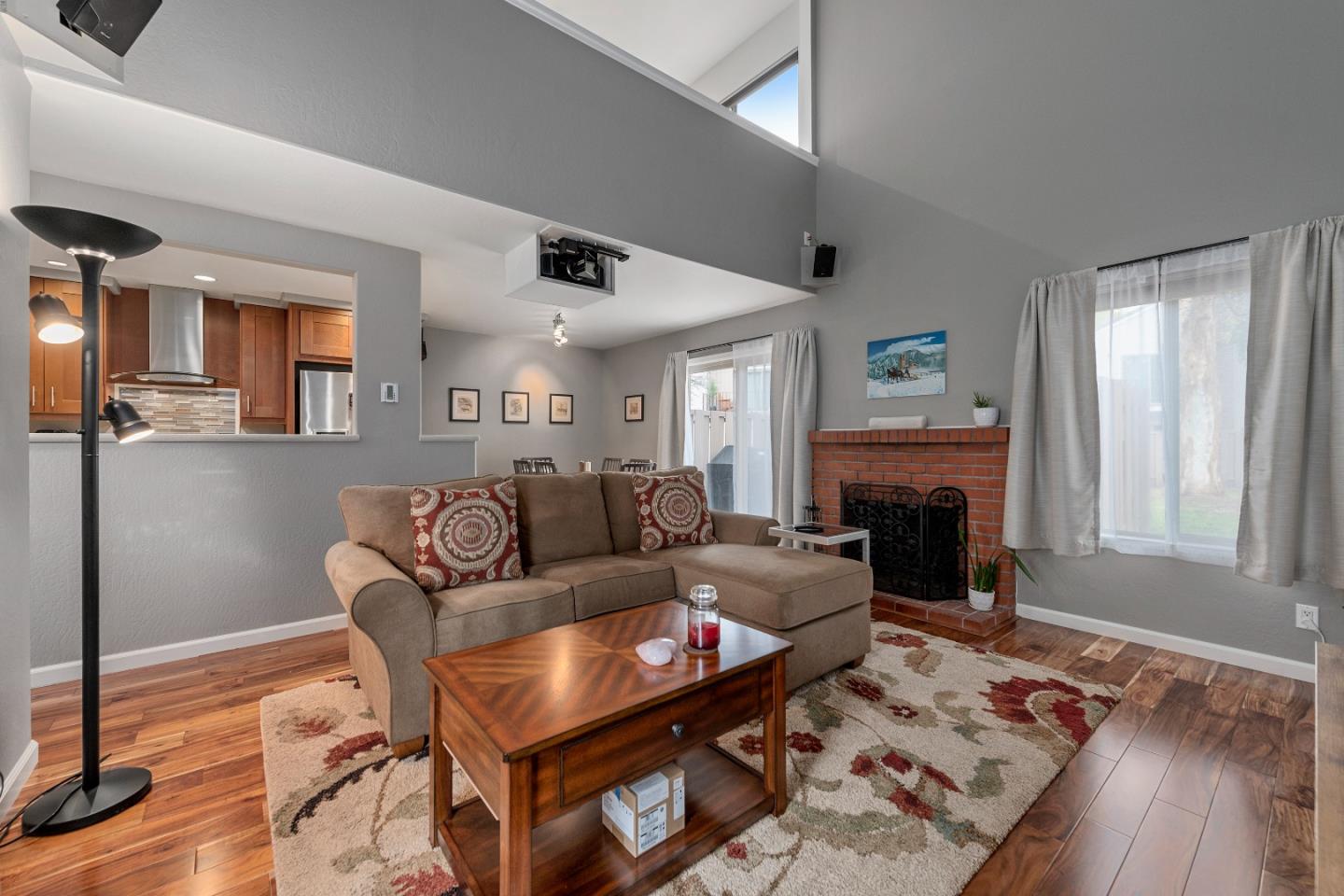 2455 Fairview Lane Santa Clara, CA 95051 - Photo 7 of 25 a living room with furniture and a fireplace