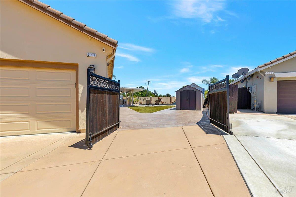 331 Frisbie Circle Vacaville, CA 95688 - Photo 82 of 93 Amazing RV Parking here with custom iron and wood gate!