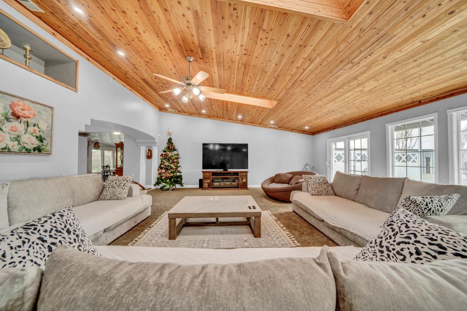 5420 East Jahant Road Galt, CA 95632 - Photo 52 of 73 a living room with furniture or couch and a flat screen tv