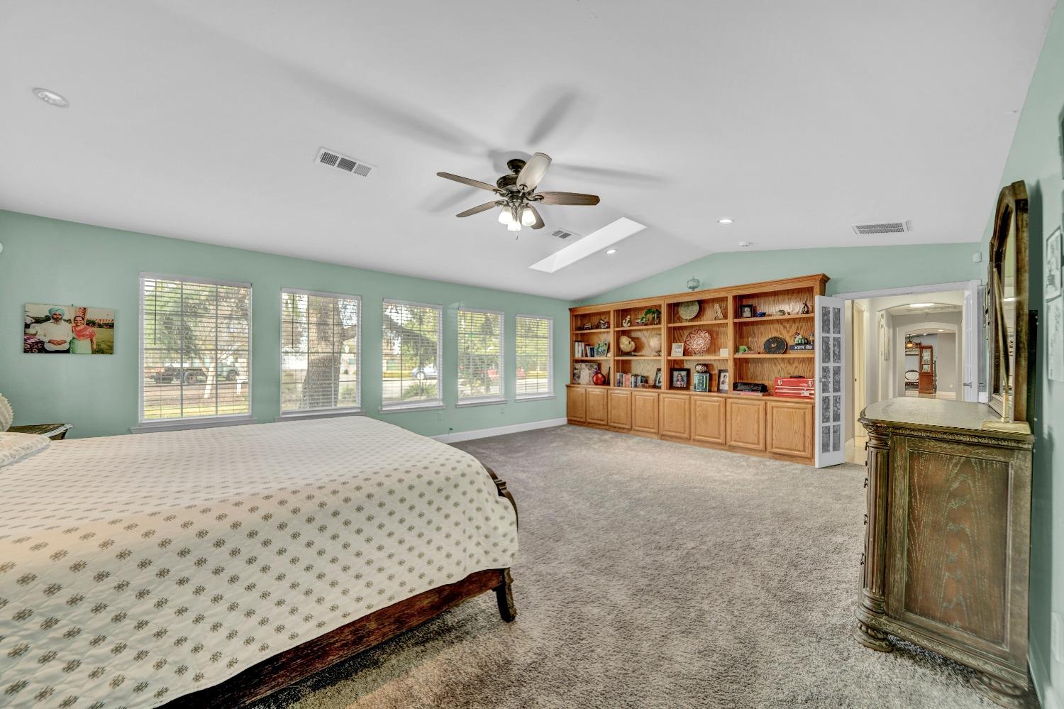 5420 East Jahant Road Galt, CA 95632 - Photo 73 of 73 a spacious bedroom with a large bed dresser and a window