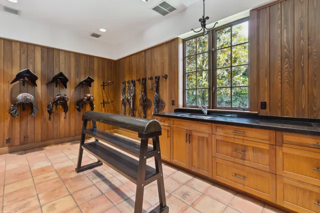 a view of swimming pool with sitting area and garden
