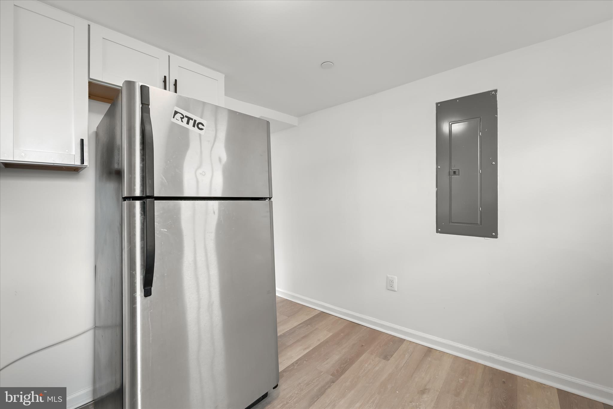 227-229 Main Street New Windsor, MD 21776 - Photo 14 of 36 a white refrigerator freezer sitting in a kitchen