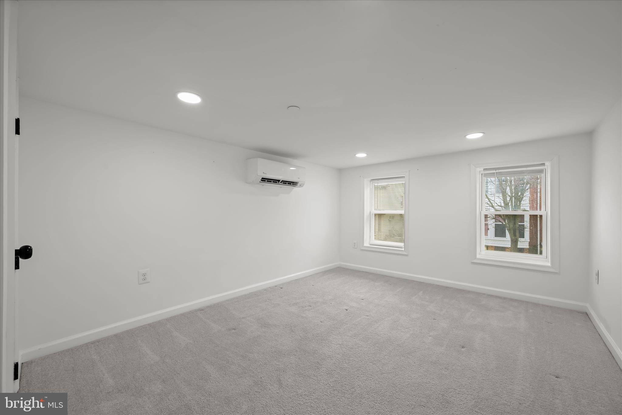 227-229 Main Street New Windsor, MD 21776 - Photo 16 of 36 a view of an empty room with a window