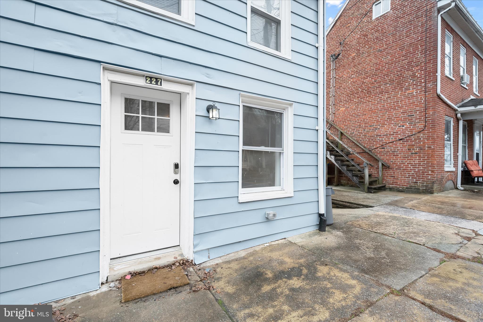 227-229 Main Street New Windsor, MD 21776 - Photo 25 of 36 a view of front door of house