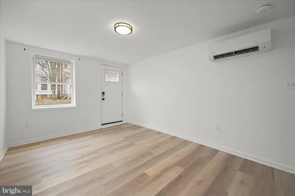 a view of empty room with windows