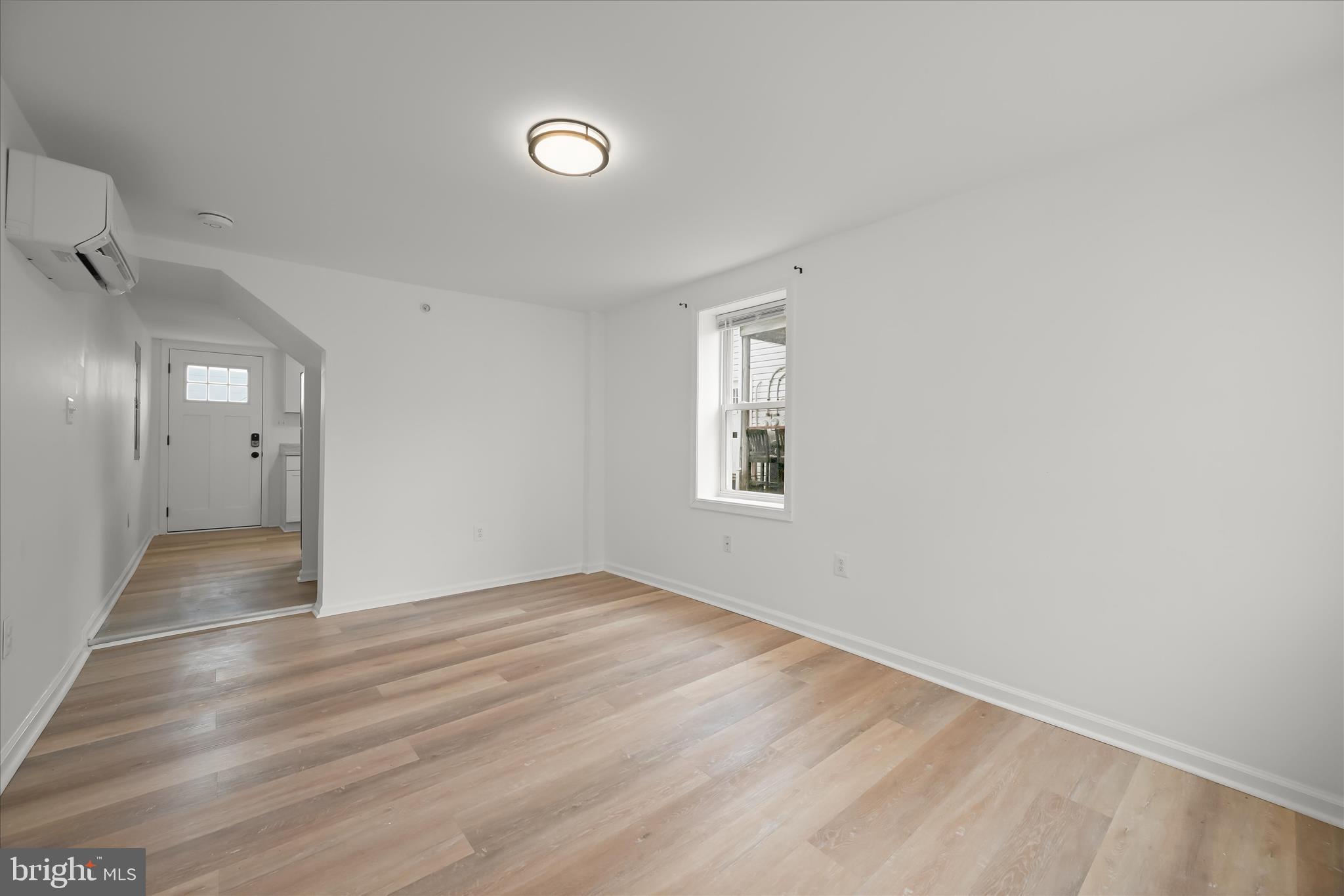 227-229 Main Street New Windsor, MD 21776 - Photo 9 of 36 wooden floor in an empty room