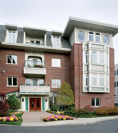 a front view of a multi story residential apartment building