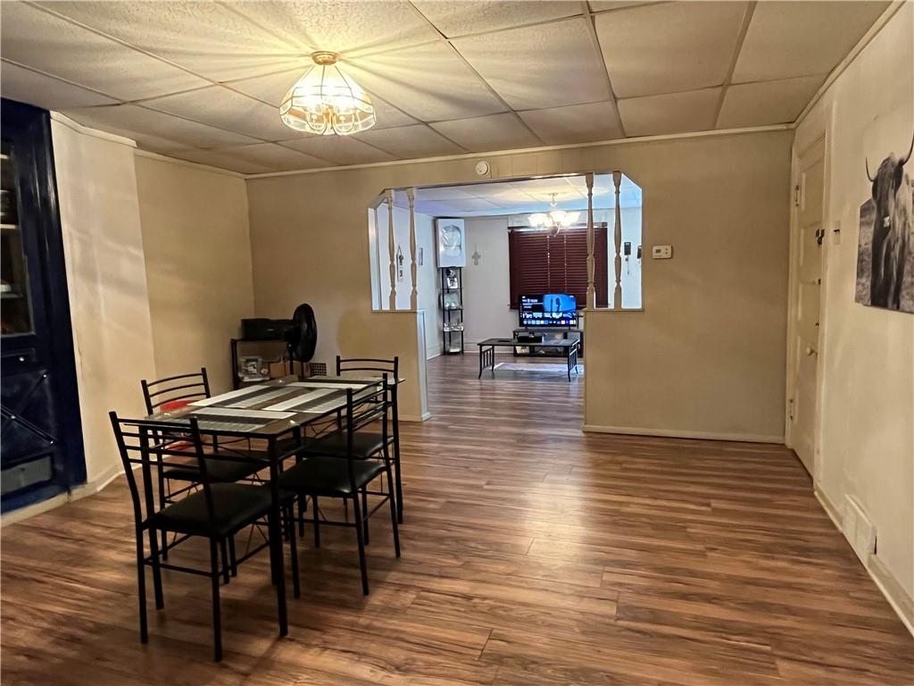 1515 Terrace Street Braddock, PA 15104 - Photo 13 of 30 a dining room with furniture and wooden floor
