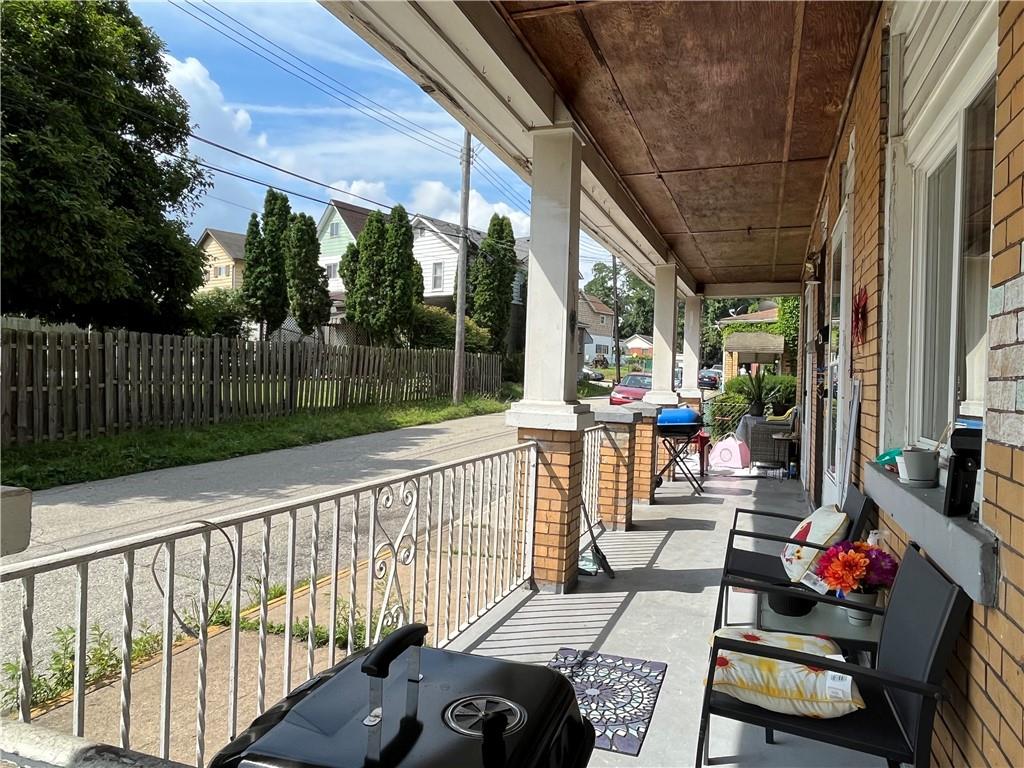 1515 Terrace Street Braddock, PA 15104 - Photo 4 of 30 a view of a patio with couches table and chairs and potted plants