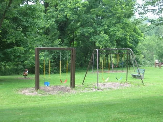 a view of outdoor space with a swimming pool