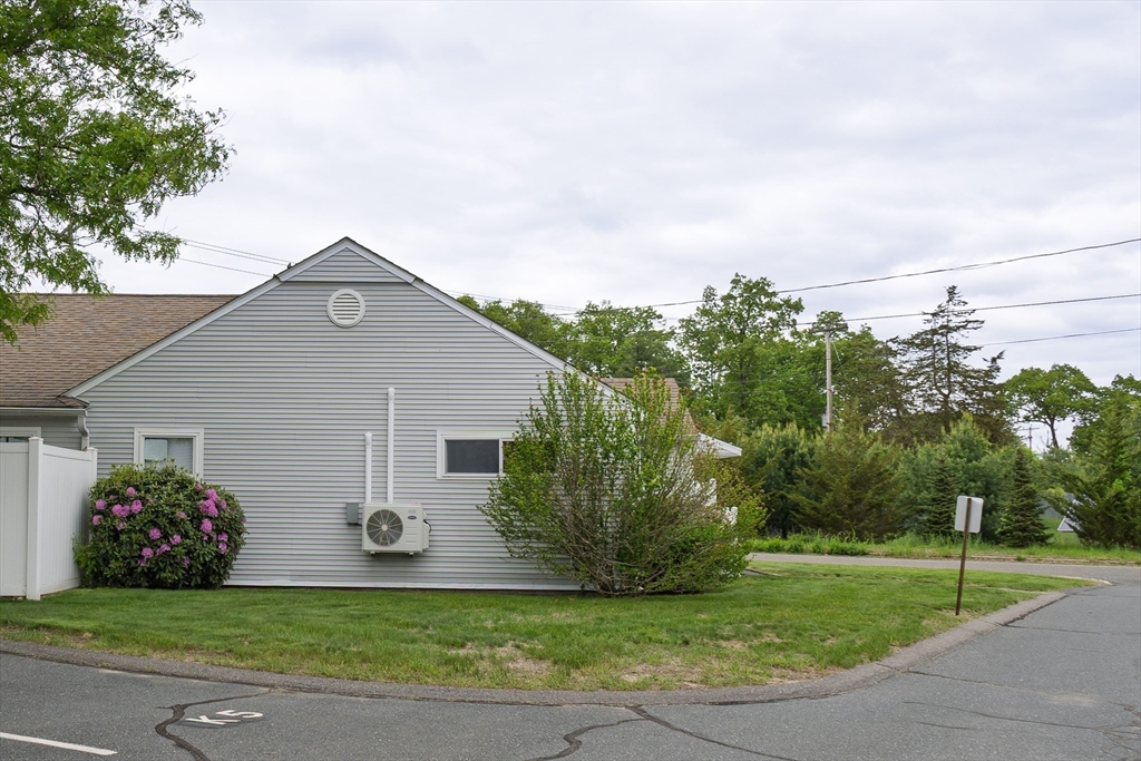 61 Outer Drive, Unit 61 Chicopee, MA 01022 - Photo 22 of 25 a view of a house with a yard