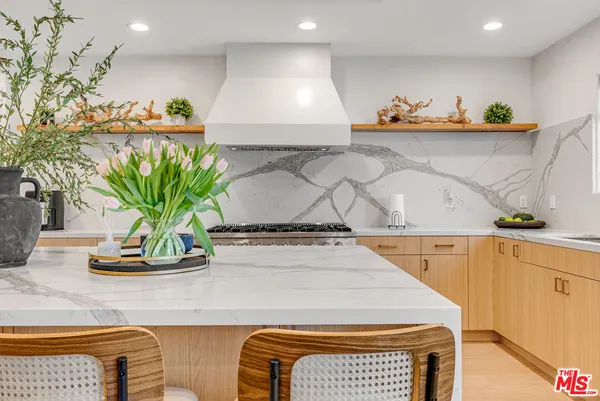 a vase of flowers sitting on a table