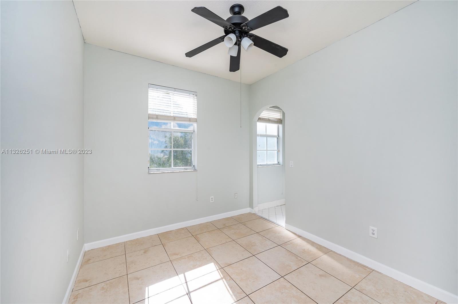 2106 Northeast 40th Road Homestead, FL 33033 - Photo 14 of 33 a view of empty room with window