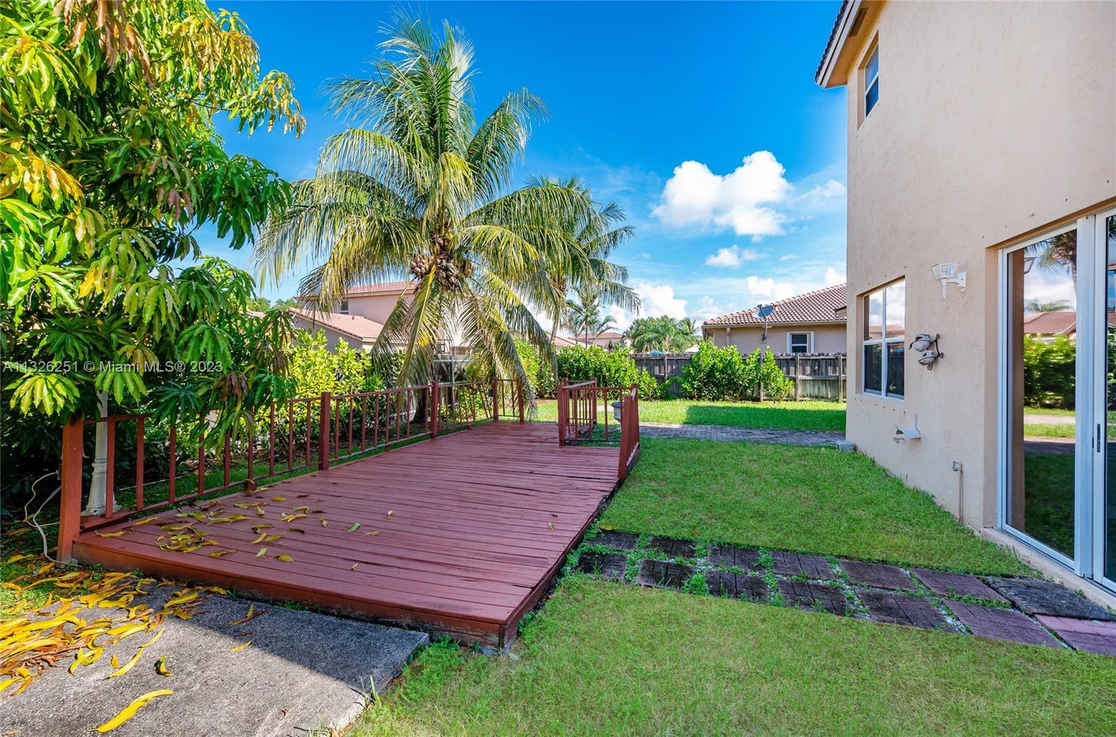 2106 Northeast 40th Road Homestead, FL 33033 - Photo 24 of 33 a view of a backyard with a garden
