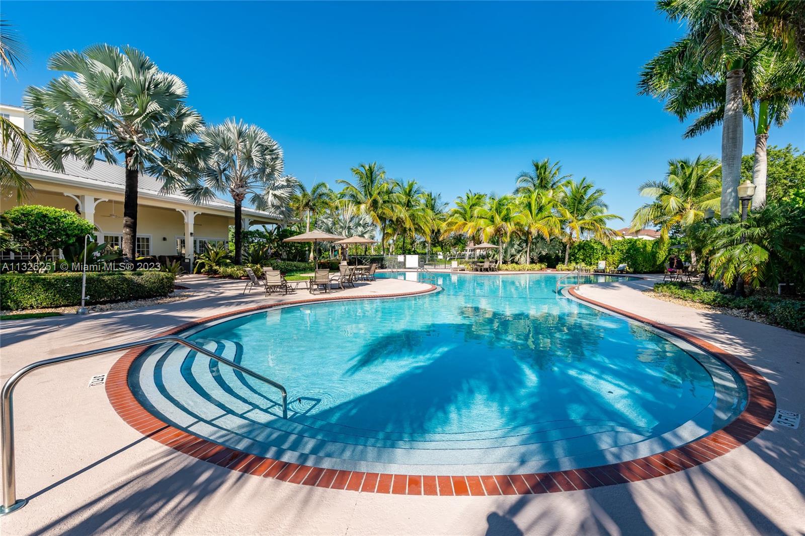 2106 Northeast 40th Road Homestead, FL 33033 - Photo 27 of 33 a view of a swimming pool with a patio