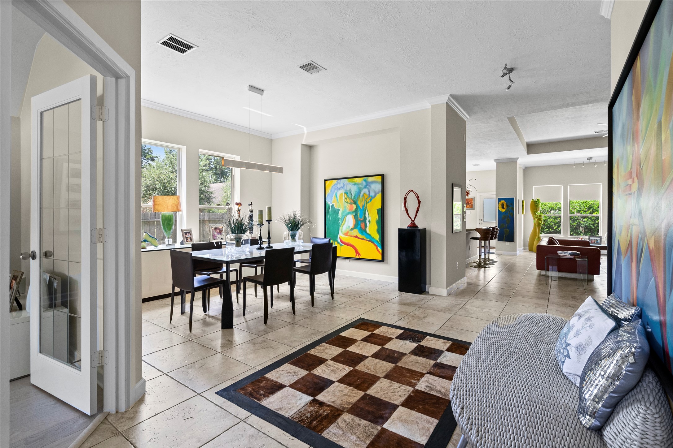 31503 Reston Cliff Court Spring, TX 77386 - Photo 1 of 28 a dining room with furniture and a rug