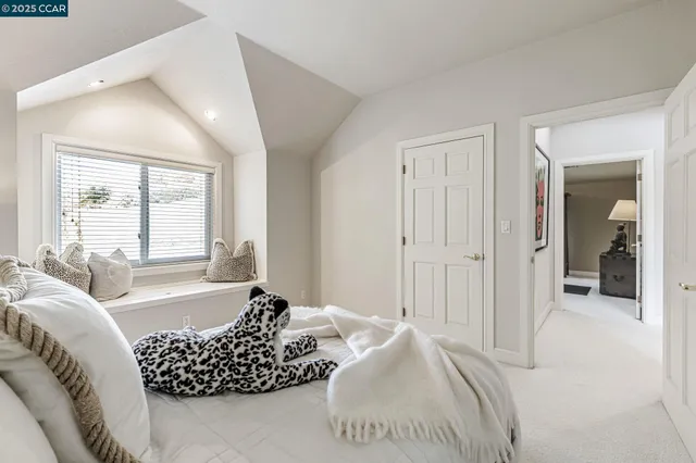 a view of a patio with a table and chairs
