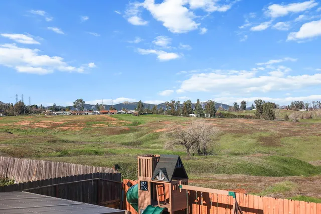 a view of lake with green space