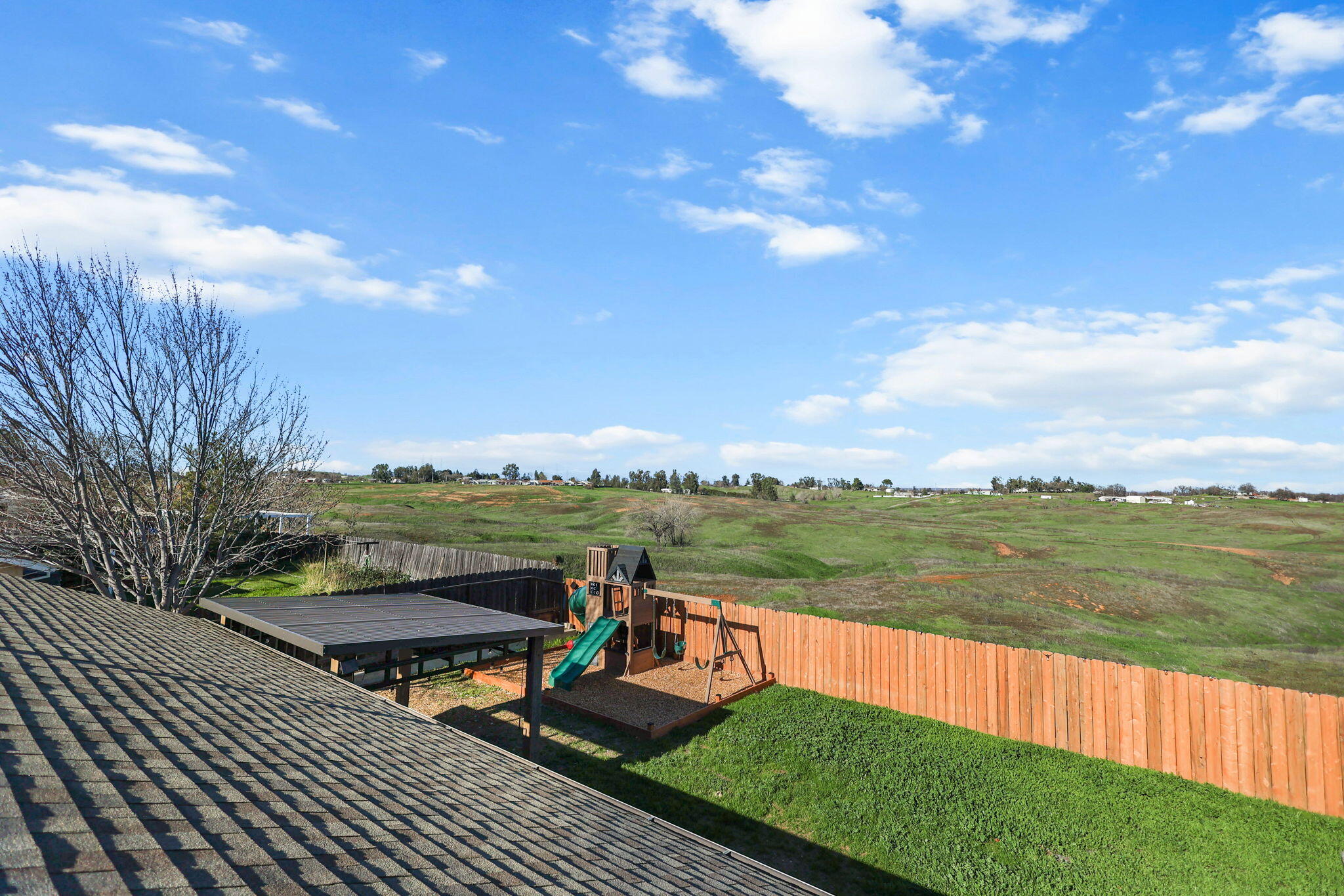 2132 Reta Way Red Bluff, CA 96080 - Photo 39 of 43 a view of a lake with couches in the patio