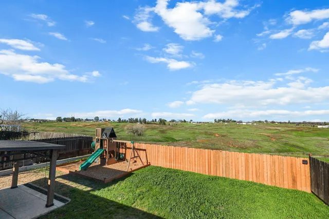 a view of a garden and lake