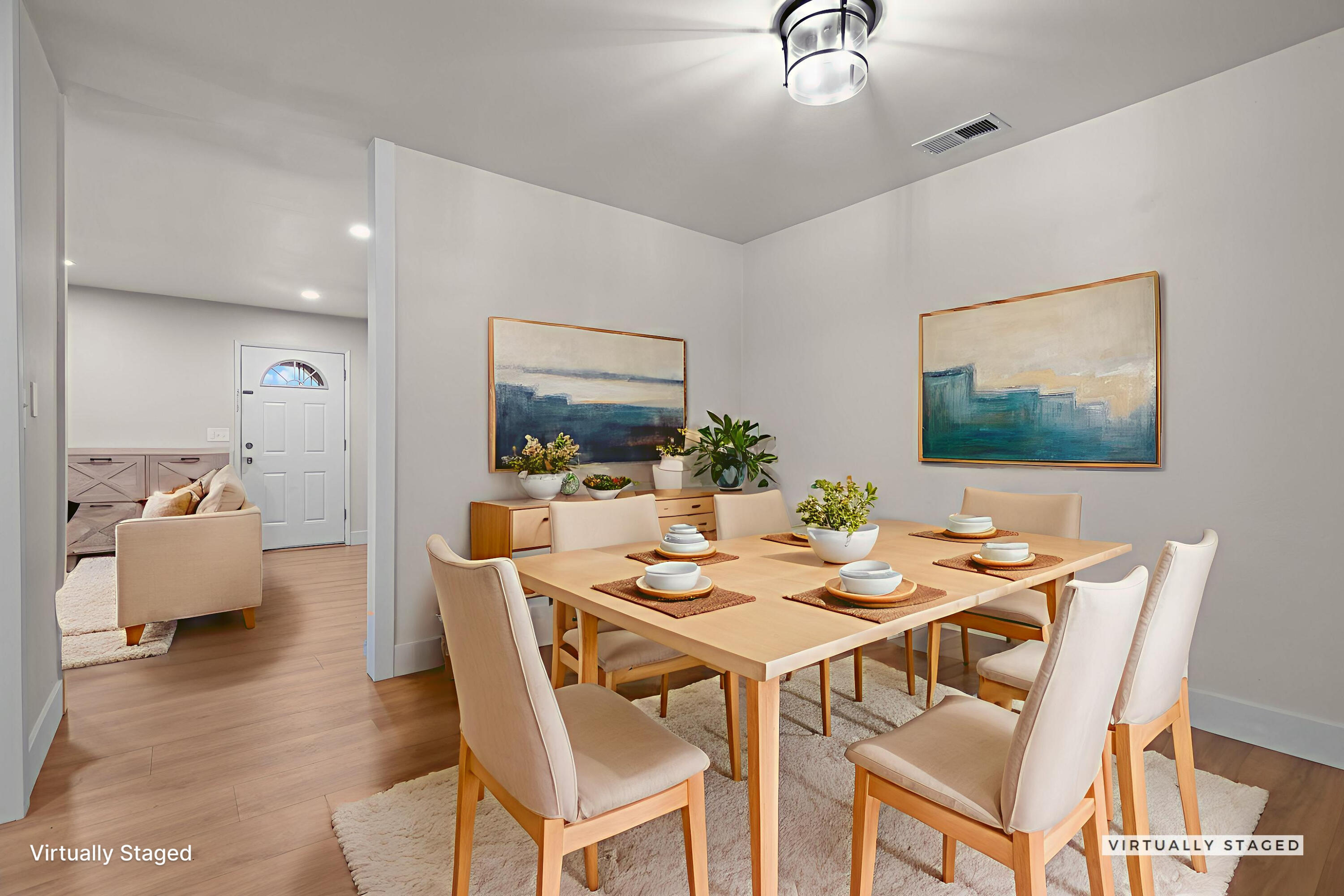 2132 Reta Way Red Bluff, CA 96080 - Photo 7 of 43 a view of a dining room with furniture and wooden floor