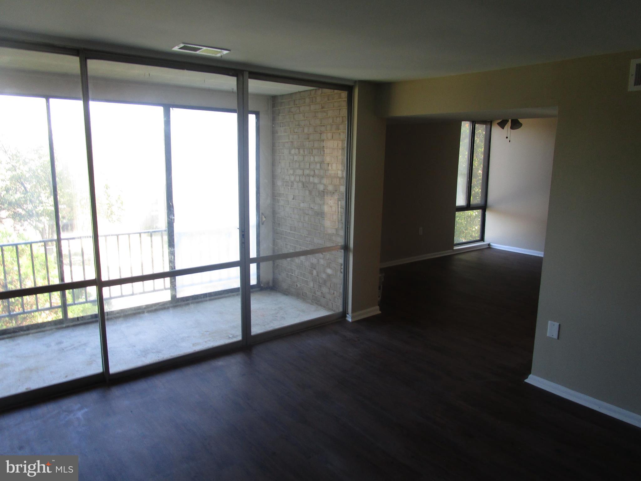 8669 Greenbelt Road, Unit 202 Greenbelt, MD 20770 - Photo 2 of 14 LIVING ROOM
