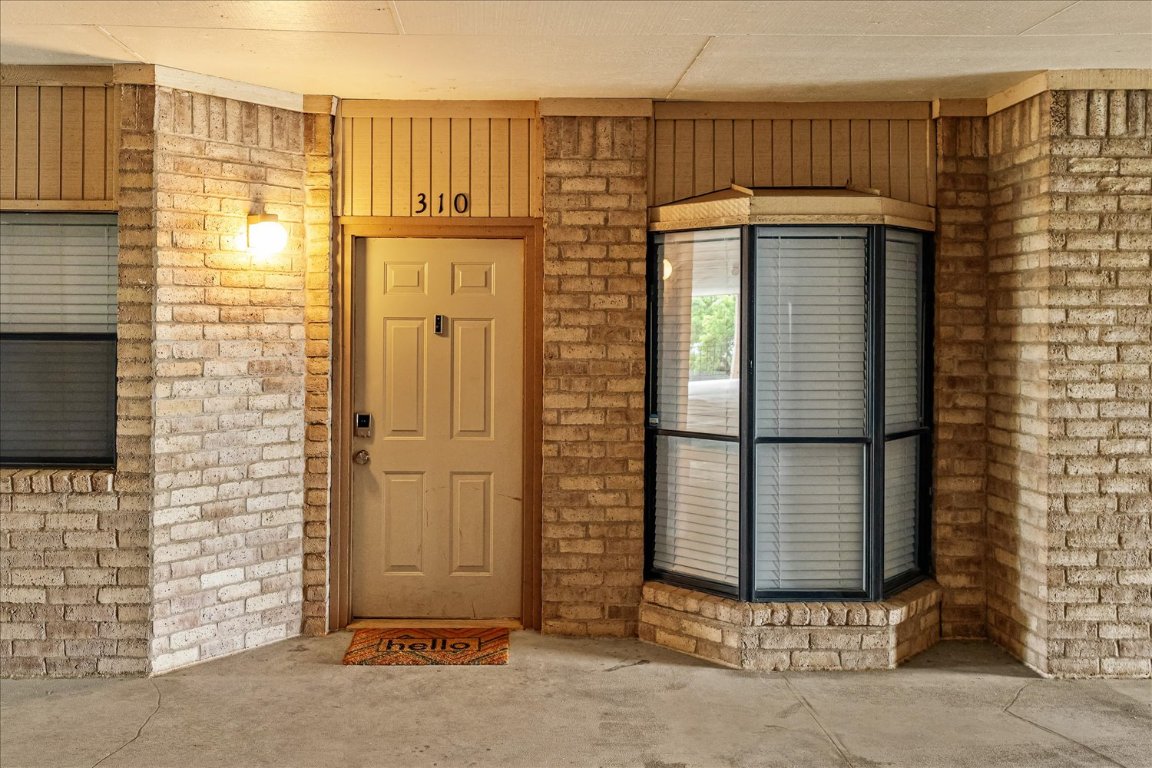 3316 Guadalupe Street, Unit 310 Austin, TX 78705 - Photo 3 of 38 a view of front door of house
