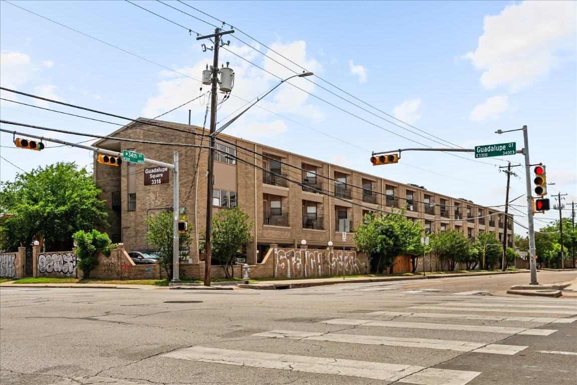 3316 Guadalupe Street, Unit 310 Austin, TX 78705 - Photo 34 of 38 a view of a tall building next to a road