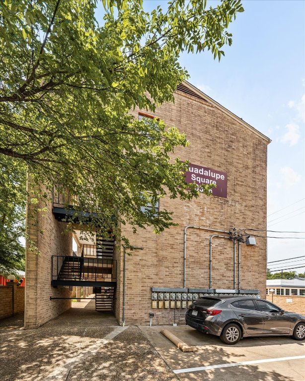 3316 Guadalupe Street, Unit 310 Austin, TX 78705 - Photo 36 of 38 a car parked in front of a building