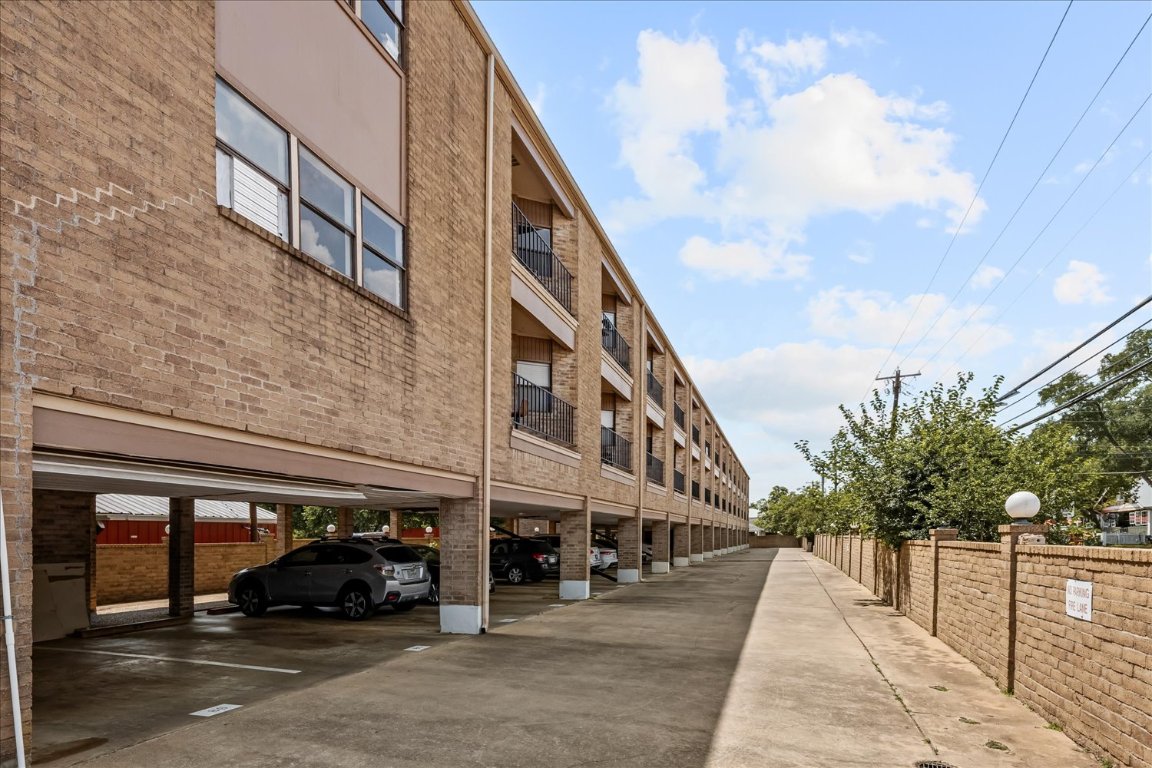 3316 Guadalupe Street, Unit 310 Austin, TX 78705 - Photo 37 of 38 a view of a building with car parked