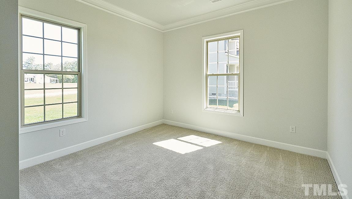 5234 Forestville Road Raleigh, NC 27616 - Photo 27 of 30 All photos of completed home are for representation purposes only, interior appts & exterior colors may vary. Home listed will actually be a side entry garage as indicated in photo.
