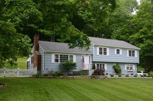 49 Tally Ho Road Ridgefield, CT 06877 - Photo 1 of 1 front view of a house with a yard