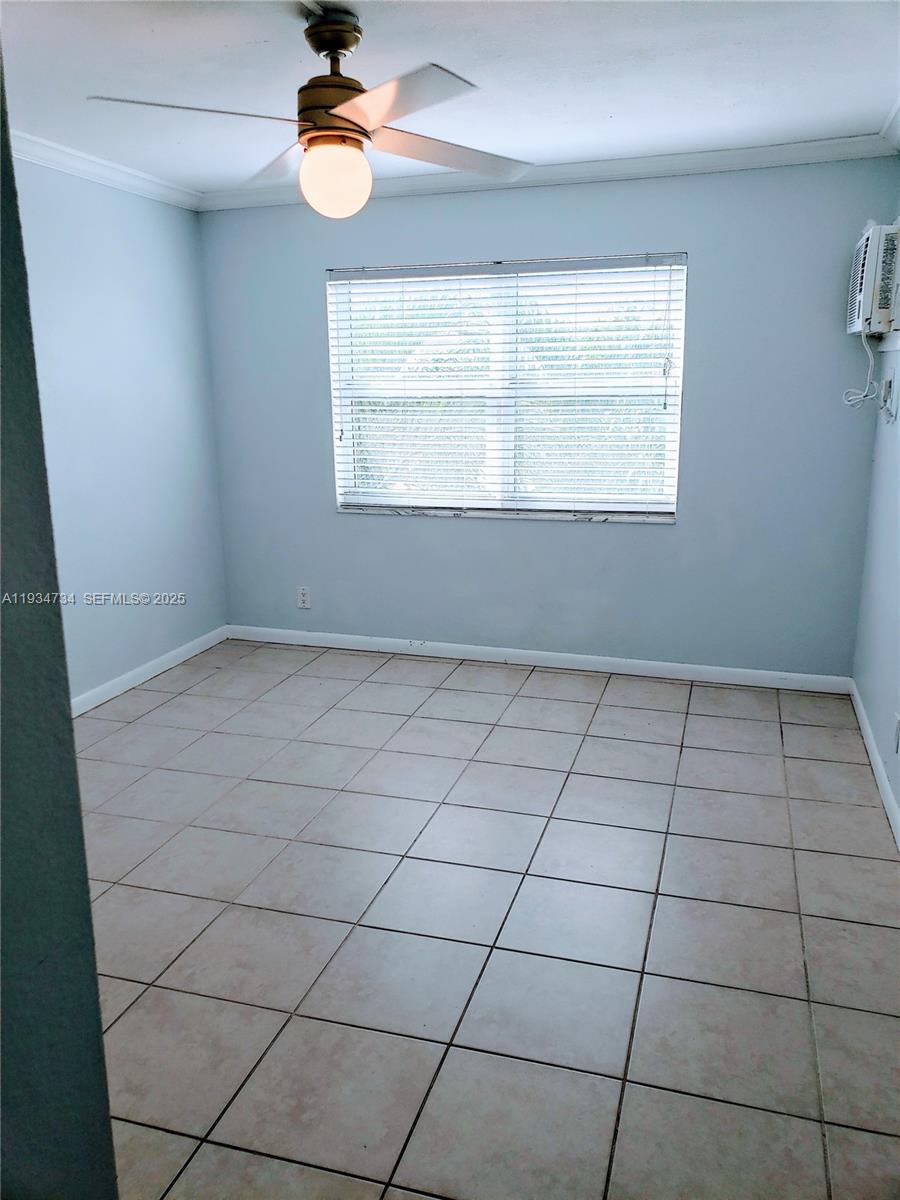 200 South Birch Road, Unit 203 Fort Lauderdale, FL 33316 - Photo 8 of 10 a view of an empty room with a window