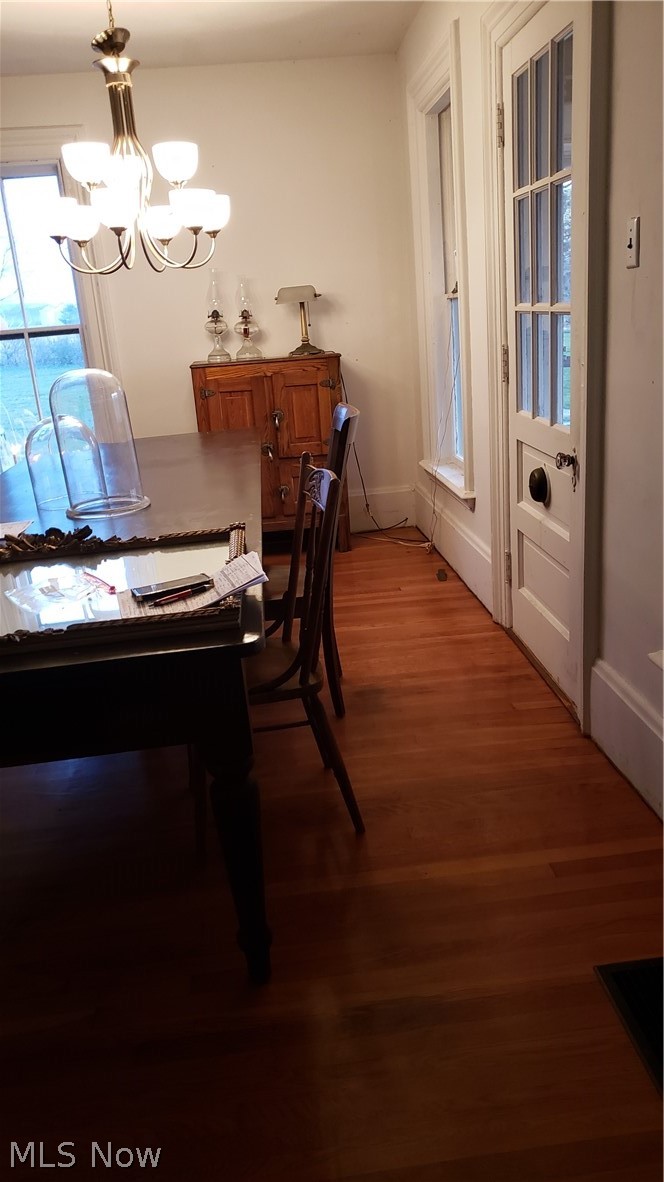 2800 Butler Road Wakeman, OH 44889 - Photo 7 of 18 Dining Room with (believed to be) Cherry hardwood floors. Door to porch.