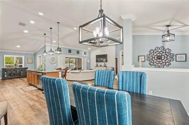 a view of a kitchen and dining room