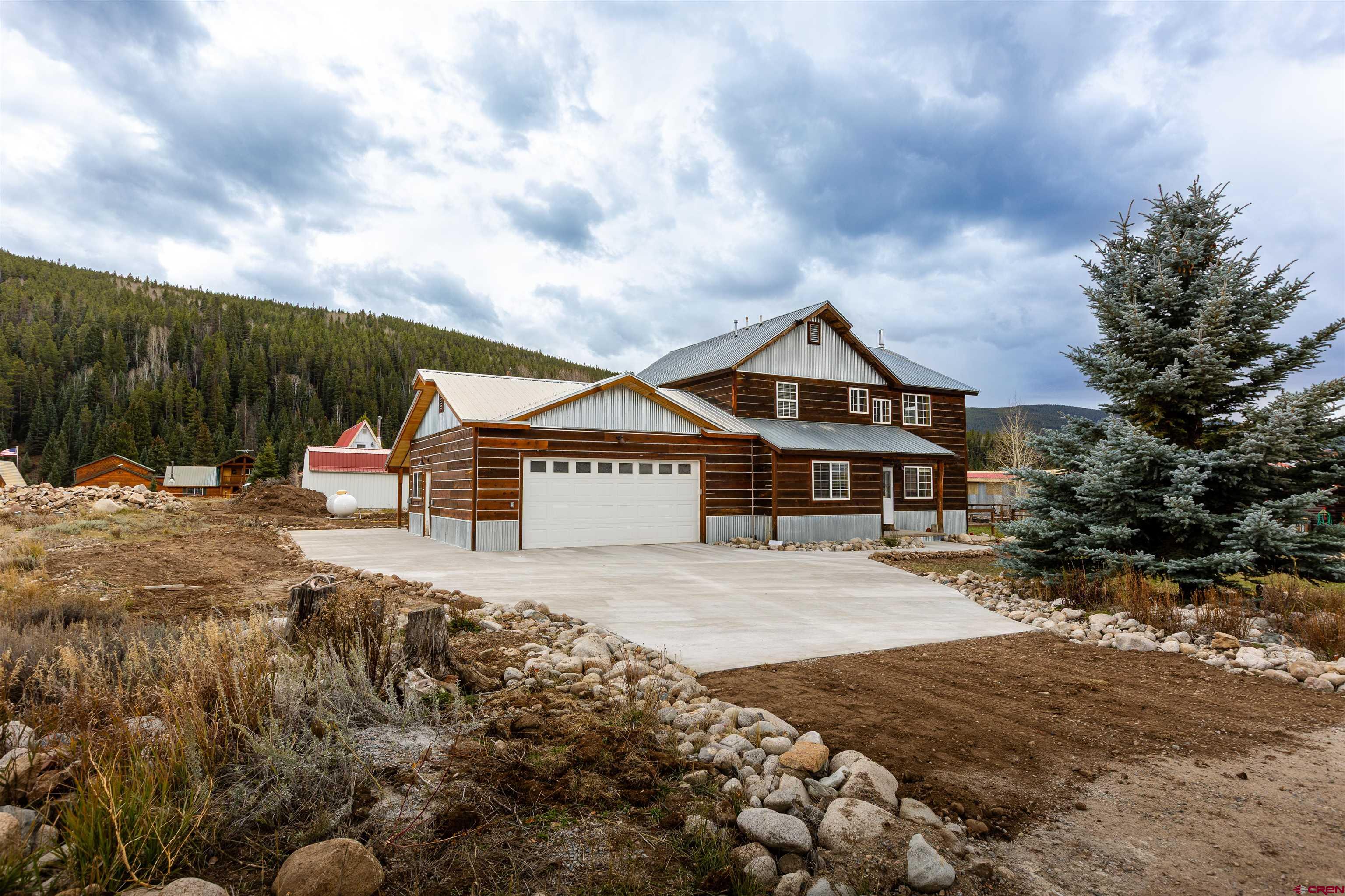 312 Main Street Pitkin, CO 81241 - Photo 1 of 38 a view of house with outdoor space and sitting area