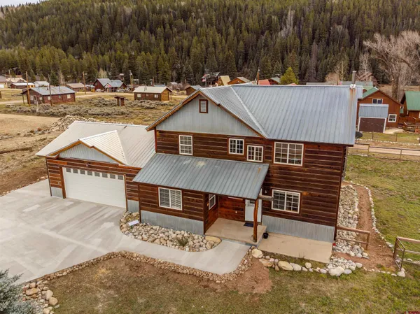 a picture of aerial view of residential houses with outdoor space