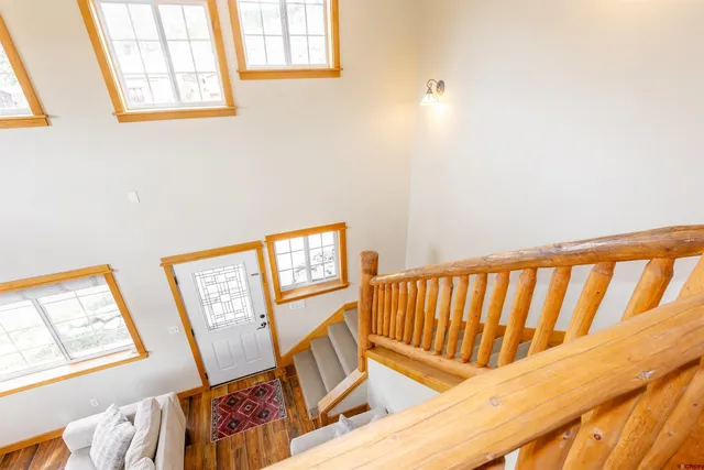 a view of a balcony with wooden floor