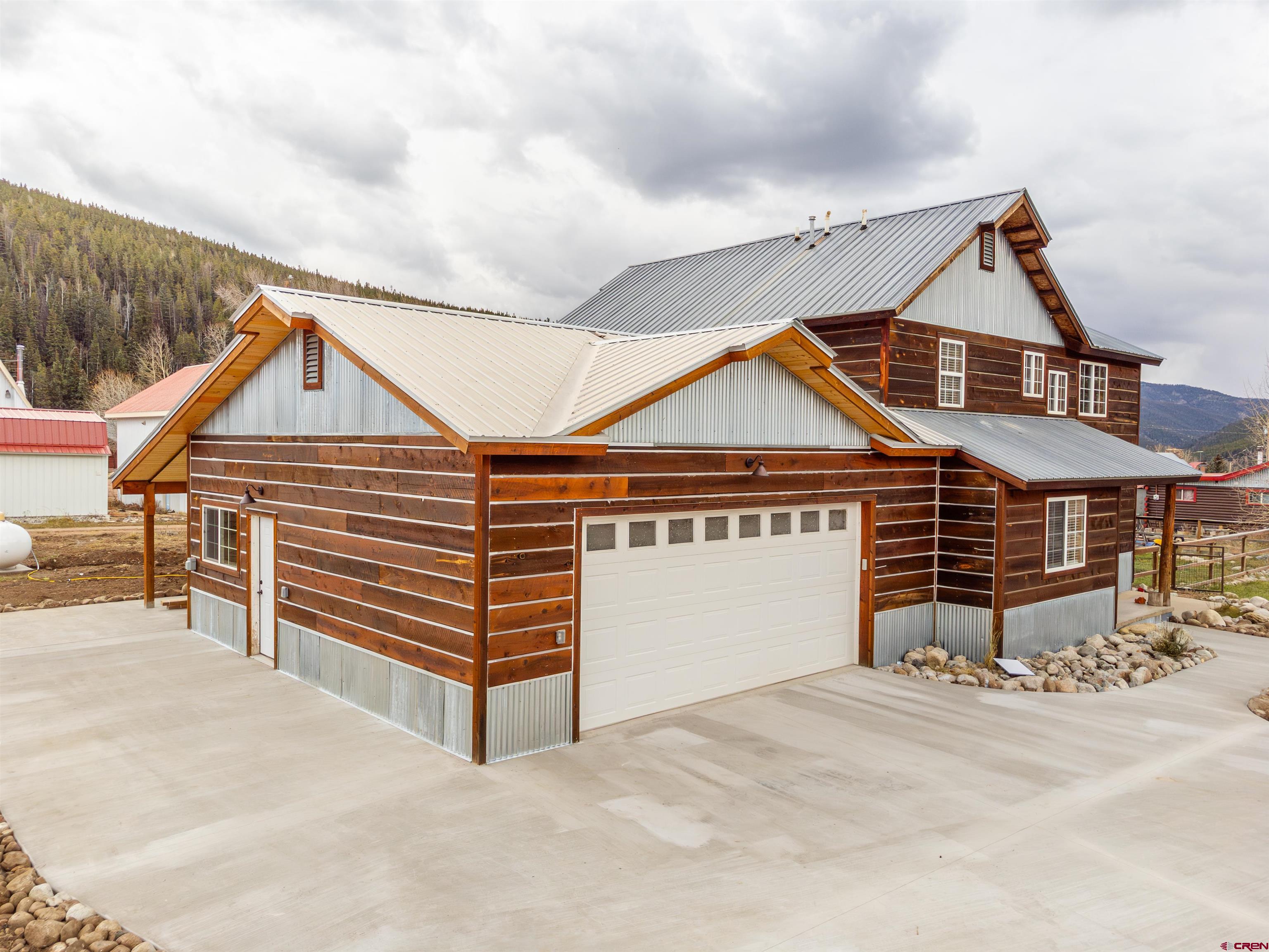 312 Main Street Pitkin, CO 81241 - Photo 20 of 38 front view of a house with a yard