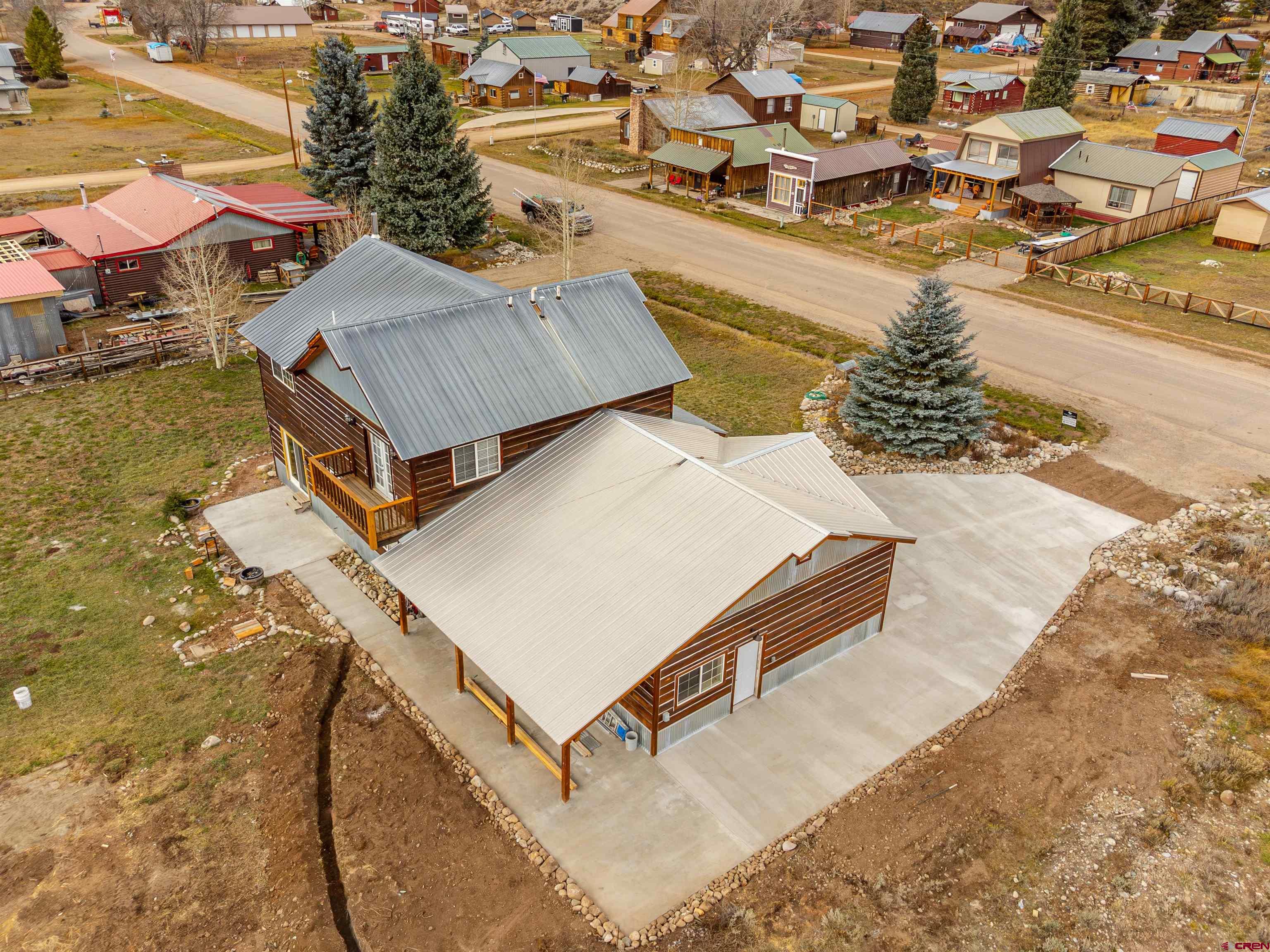 312 Main Street Pitkin, CO 81241 - Photo 22 of 38 an aerial view of residential houses with outdoor space