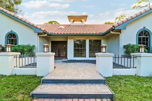 a view of a house with a porch