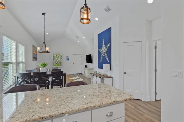 a view of a dining room and livingroom