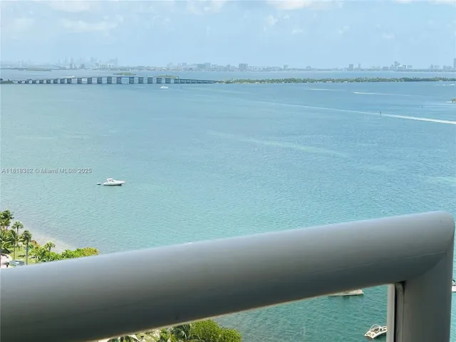 a view of a lake and a yard