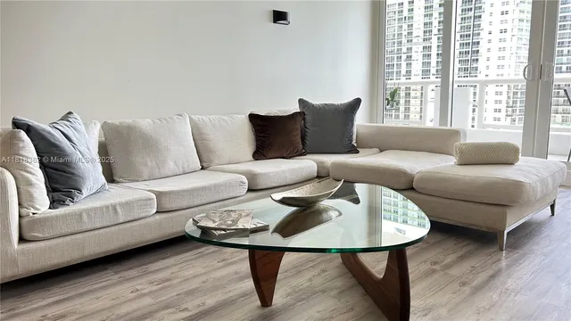 a living room with furniture and a window