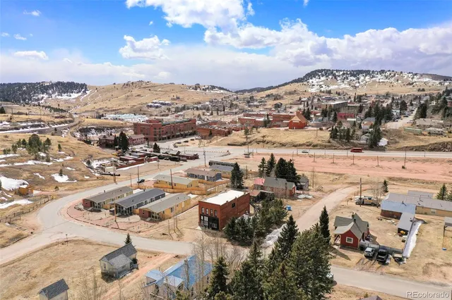 an aerial view of residential building with parking space