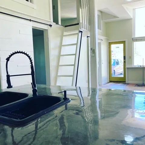 a living room filled with furniture