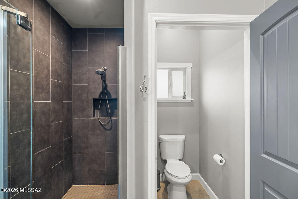 16276 East Empire View Road Vail, AZ 85641 - Photo 39 of 51 a bathroom with a toilet and a shower