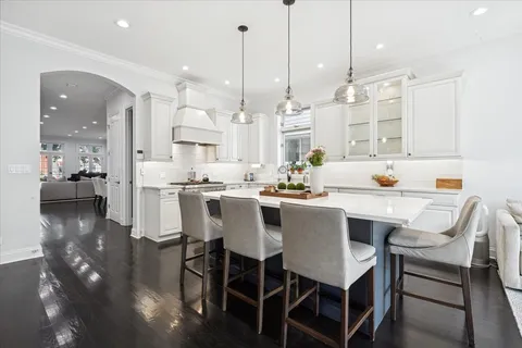 a spacious bedroom with a large bed and a couch