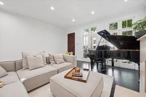 a living room with furniture and a table
